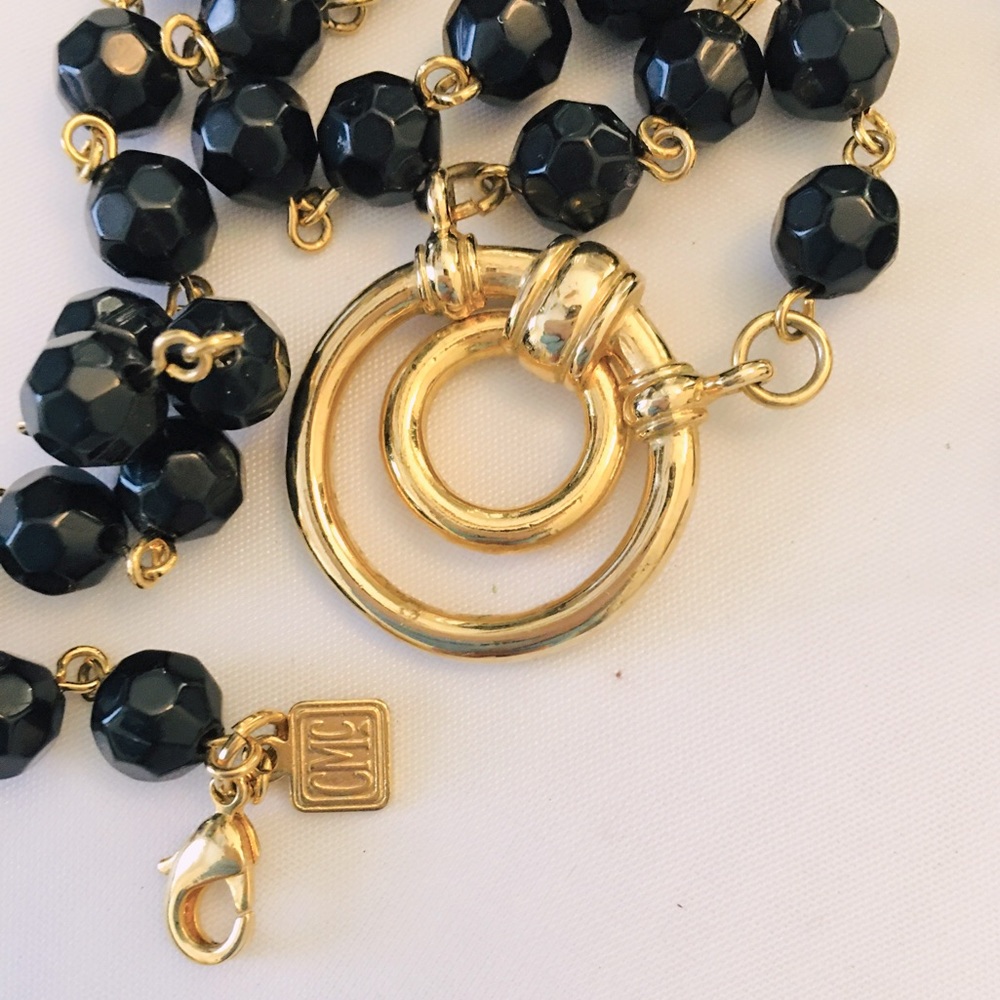 CMC gold tone hinge pendant black crystal necklace